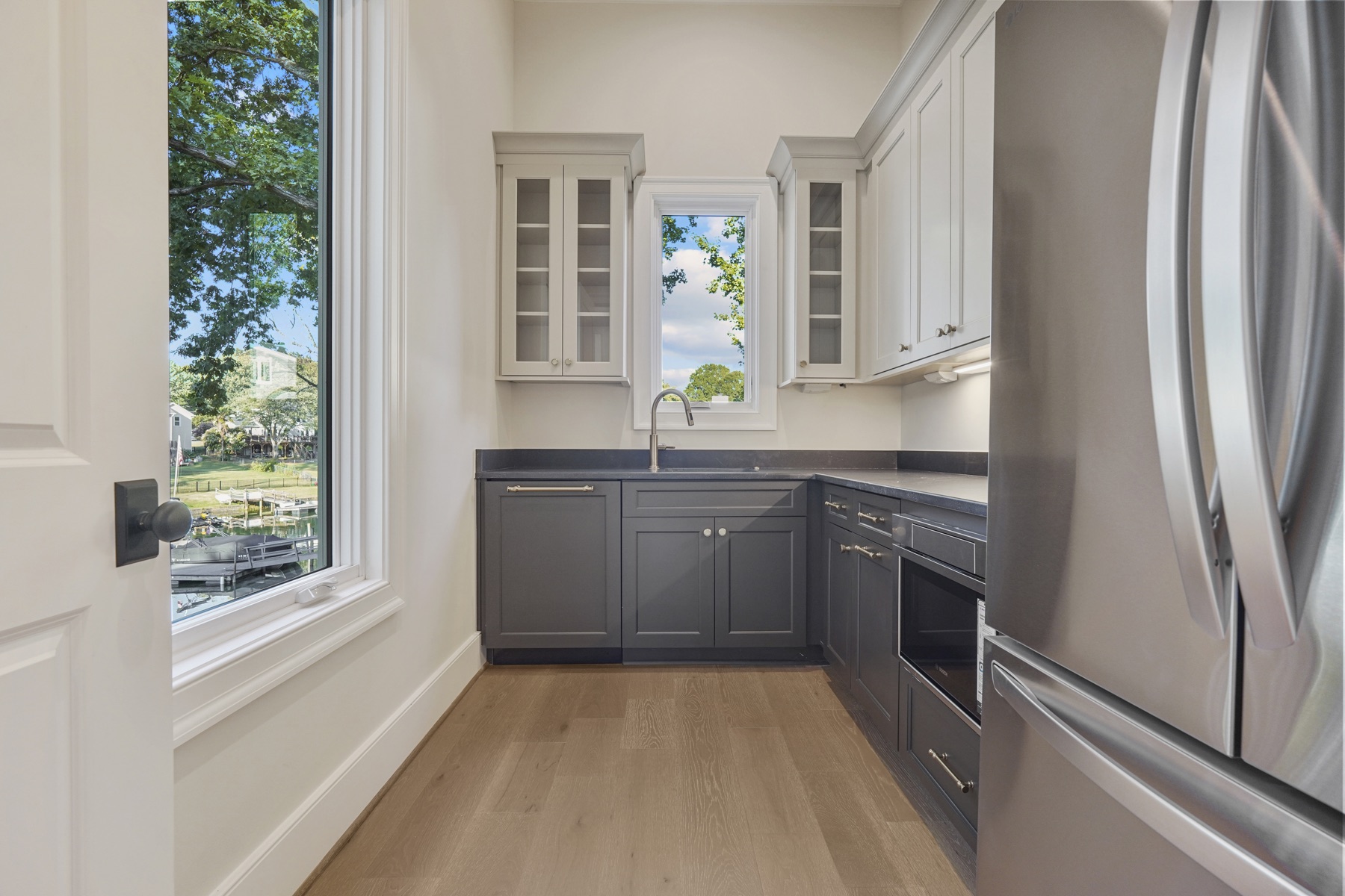 Kitchen prep area with cabinetry and a sink