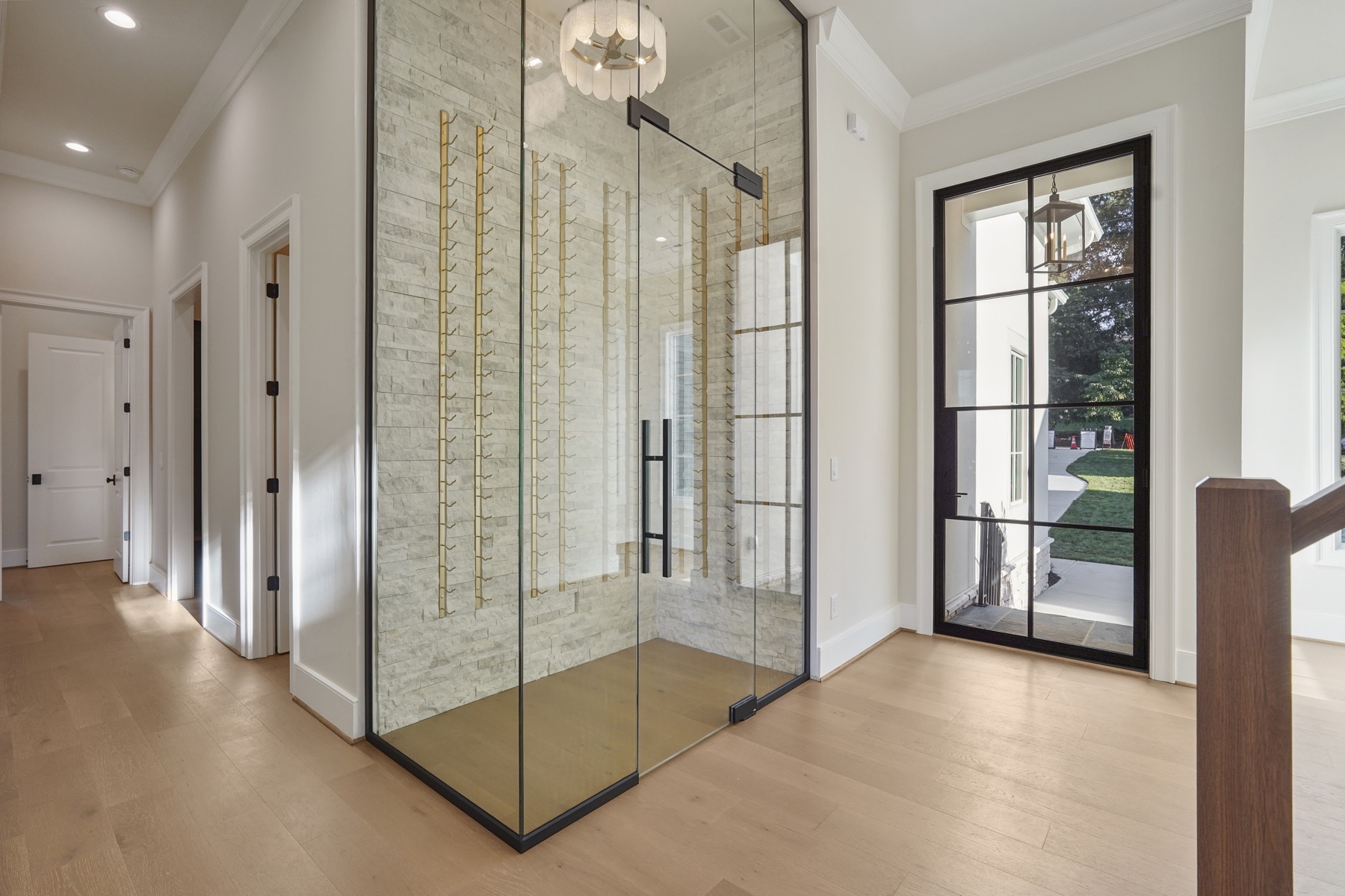 Entry hall with glass doors and custom details