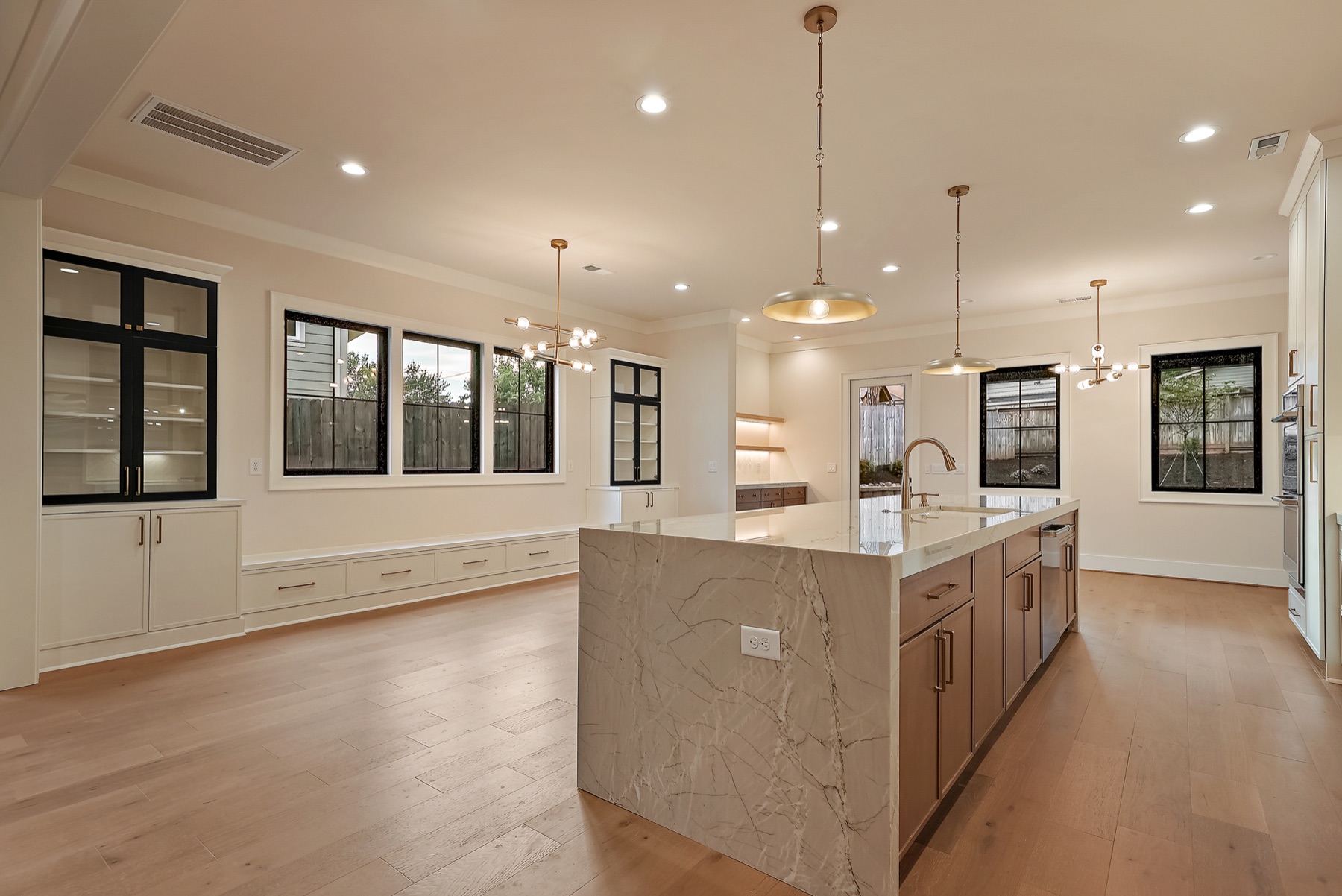 Kitchen island beside an open living area