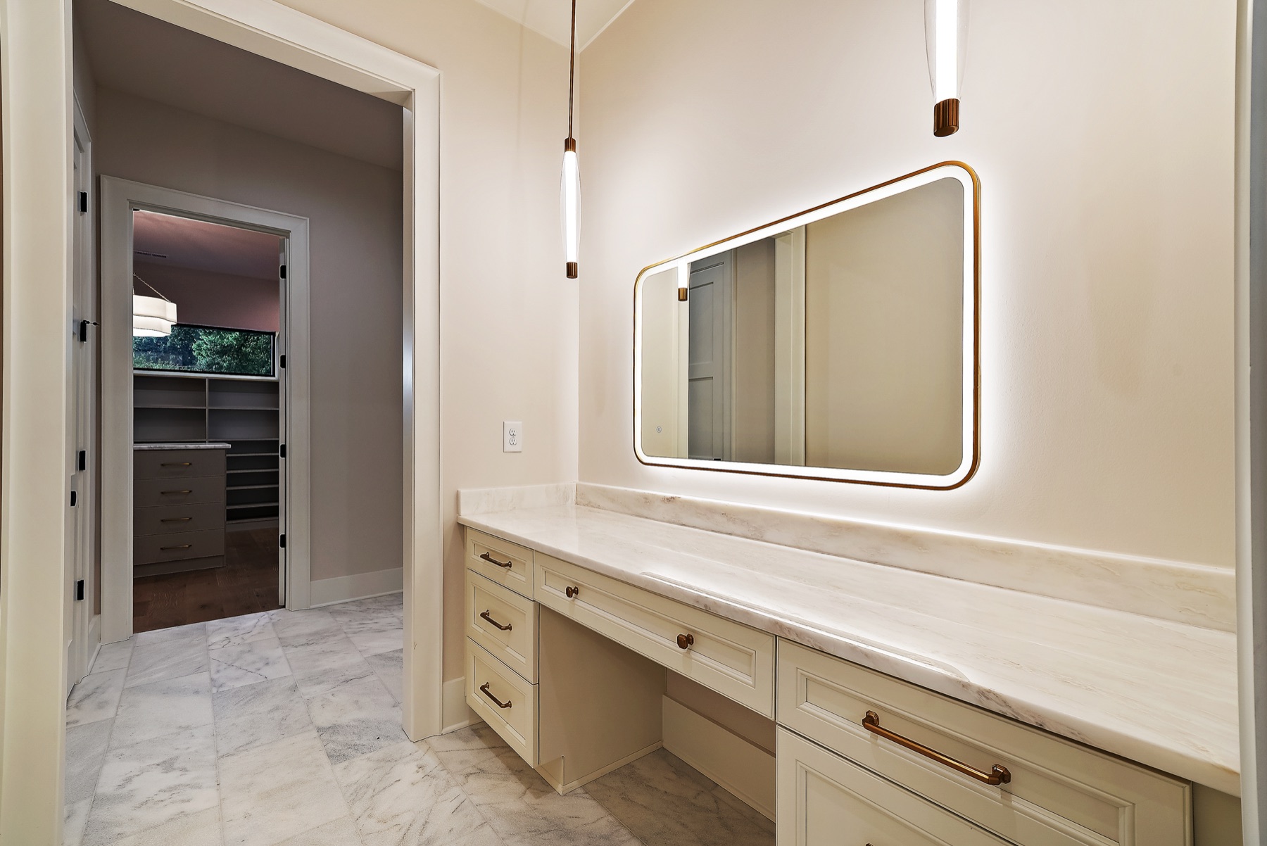 Bathroom with a freestanding tub and glass shower