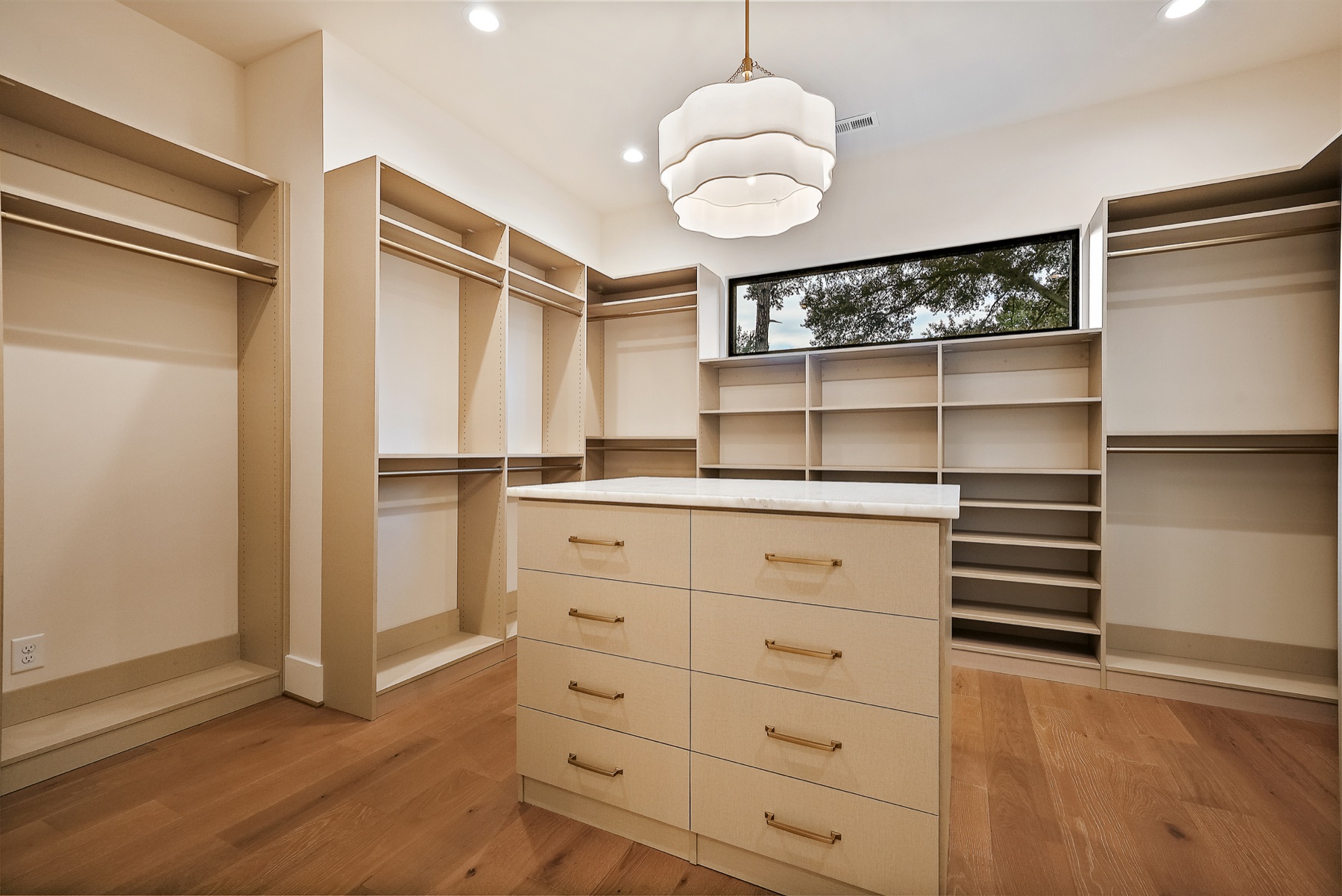 Vanity with illuminated mirror and built-in storage
